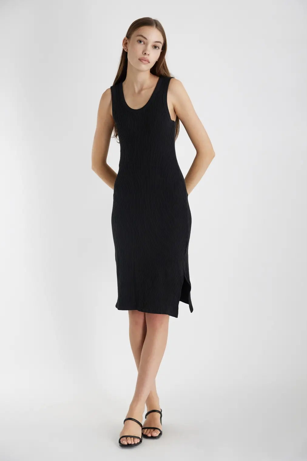 For lounging or dressing up, The Jessy Dress is a versatile tank dress crafted in a thermal waffle knit fabric - durable and soft with added warmth. A classic addition to your wardrobe. We would style this with an oversized trench and some loafers for a brunch date or coffee. 