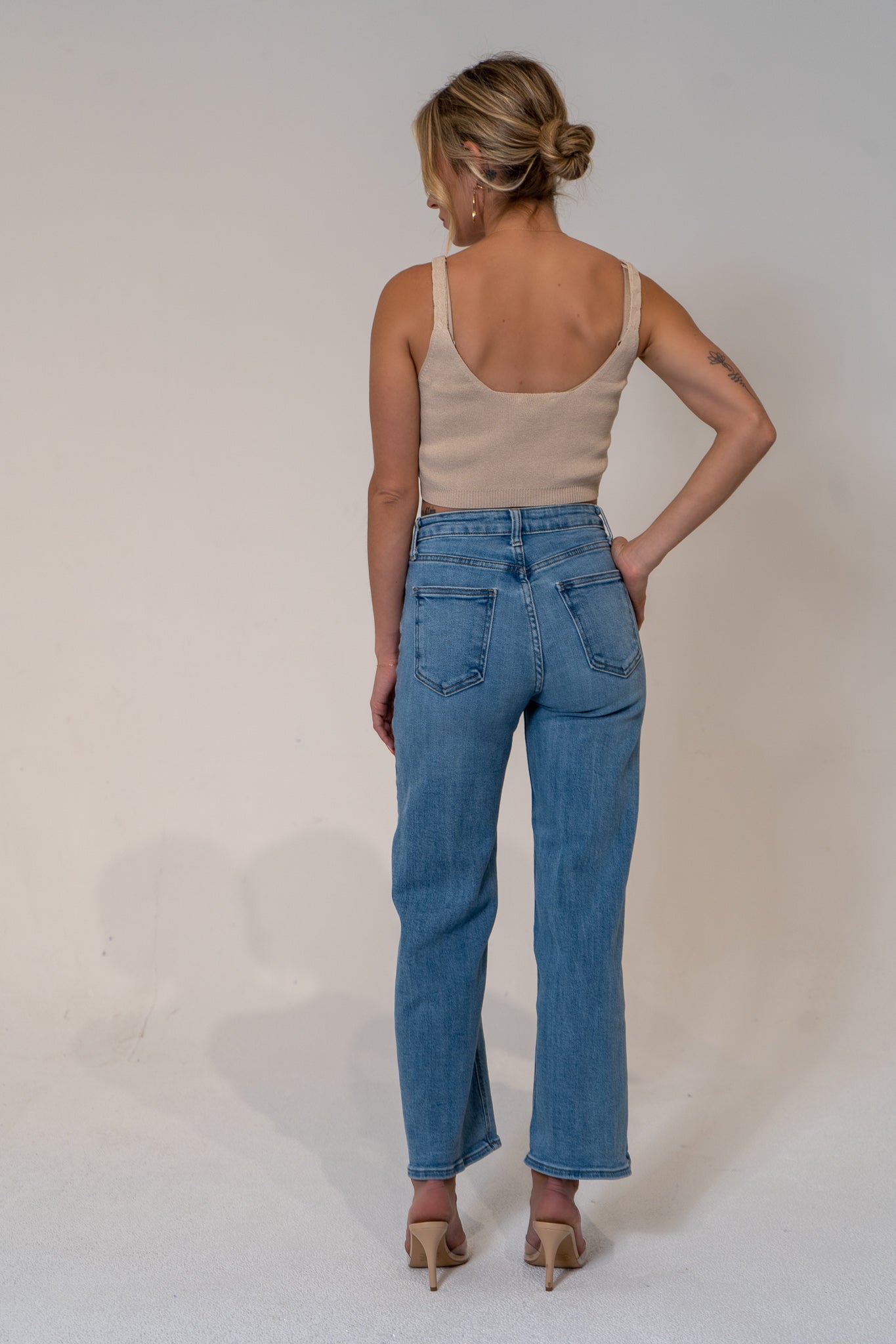 Designed for you with thoughtful construction, precise fitting and quality fabric. Slowly widens from waist to bottom, hugs your tush in all the right ways and is a staple for a polished and stylish wardrobe. Fit for the office, the beach, the market or a night out- the Nexus is your next favorite staple.   Medium Denim. 