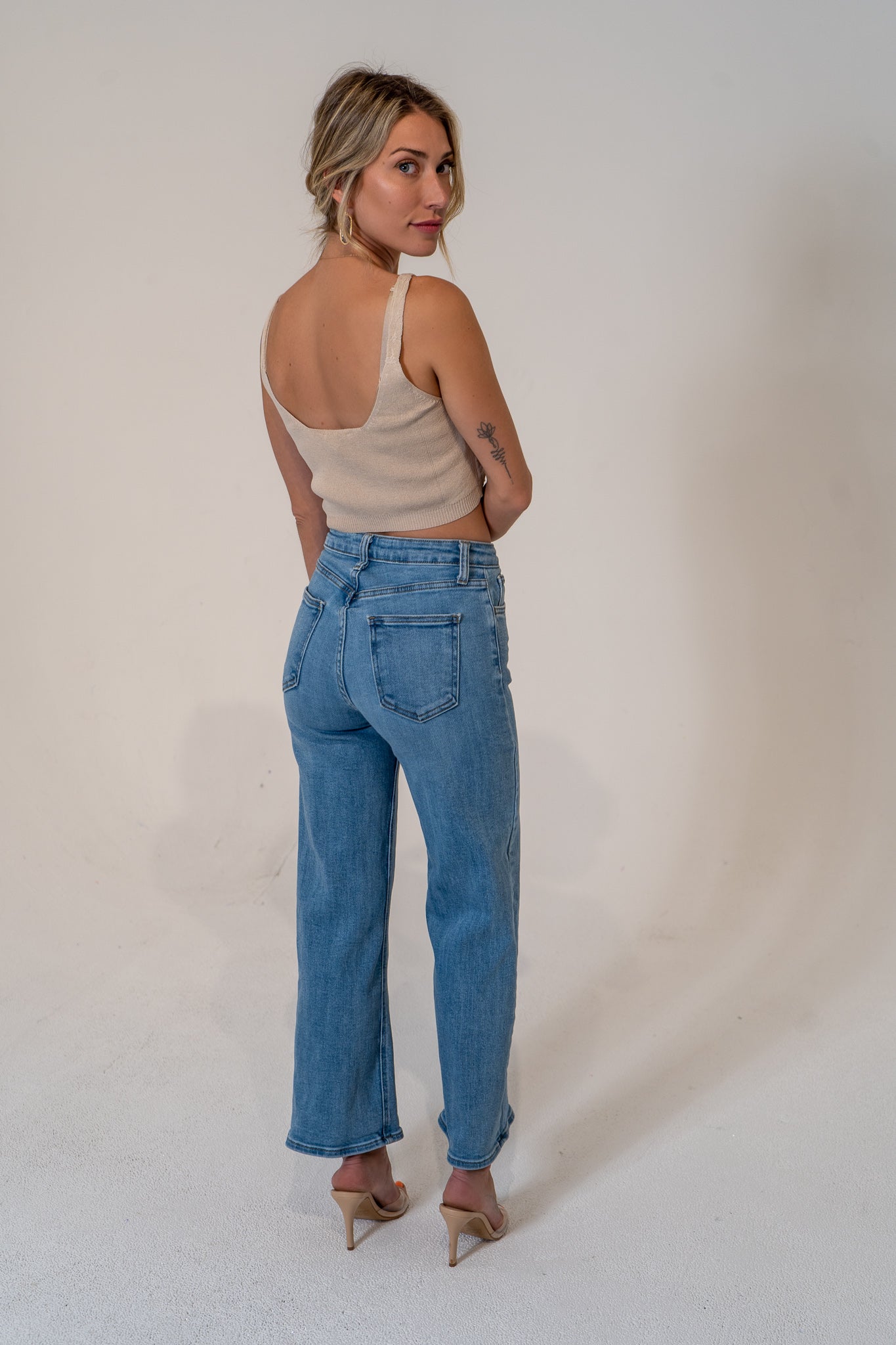 Designed for you with thoughtful construction, precise fitting and quality fabric. Slowly widens from waist to bottom, hugs your tush in all the right ways and is a staple for a polished and stylish wardrobe. Fit for the office, the beach, the market or a night out- the Nexus is your next favorite staple.   Medium Denim. 