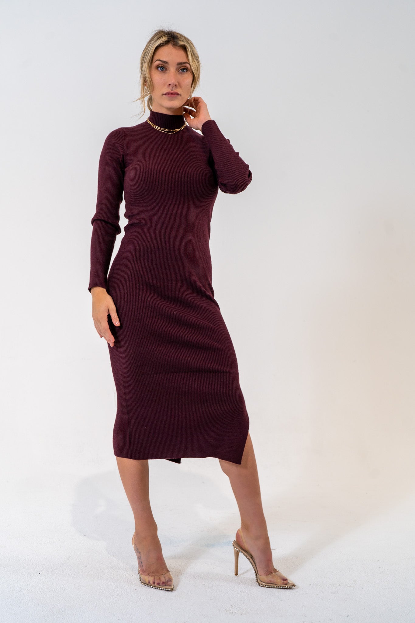 A holiday grab and go. The Playing Favorites dress is minimal and easy to style with just about everything. Ribbed bodycon fit, mock neck and side slit detail. Soft fabric but body hugging material to make sure all eyes are on you.