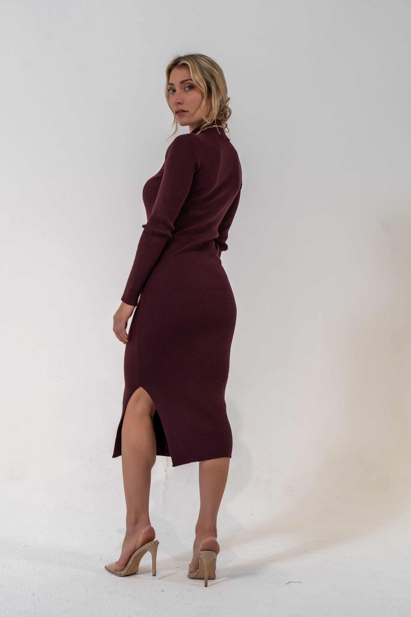 A holiday grab and go. The Playing Favorites dress is minimal and easy to style with just about everything. Ribbed bodycon fit, mock neck and side slit detail. Soft fabric but body hugging material to make sure all eyes are on you.